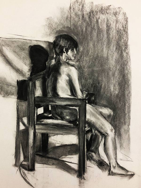 figure drawing of a woman in chair drawing